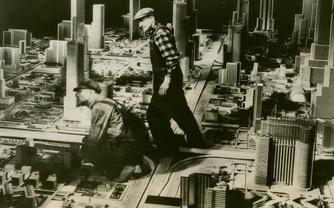 General Motors - Futurama - Artists standing among models of buildings